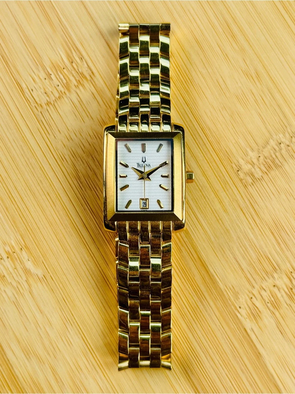 Bulova Gold Tone White Pattern Dial Date Quartz Watch Analog Water Resistant